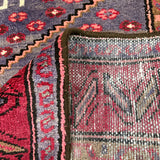 Vintage Houpa Zanjan Rug — Three Red Geometric Medallions on a Dark Field. Original rug photograph; SKU 30175; source 30175 IMG_6715.