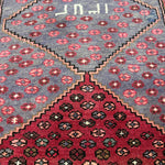 Vintage Houpa Zanjan Rug — Three Red Geometric Medallions on a Dark Field. Original rug photograph; SKU 30175; source 30175 IMG_6726.