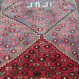 Vintage Houpa Zanjan Rug — Three Red Geometric Medallions on a Dark Field. Original rug photograph; SKU 30175; source 30175 IMG_6726.
