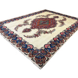 Vintage Tabriz Rug, angled view showing the full field and borders, hand-knotted wool pile. SKU 30228.