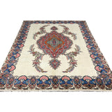 Vintage Tabriz Rug, front perspective view of the complete rug, hand-knotted wool pile. SKU 30228.