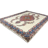 Vintage Tabriz Rug, diagonal perspective view of the complete rug, hand-knotted wool pile. SKU 30228.