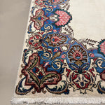Vintage Tabriz Rug, close-up of the patterned corner and edge, hand-knotted wool pile. SKU 30228.
