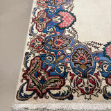 Vintage Tabriz Rug, close-up of the patterned corner and edge, hand-knotted wool pile. SKU 30228.