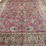 Persian Tabriz rug in dusty rose with ivory border and ornate medallion patterns
