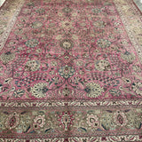 Persian Tabriz rug in dusty rose with ivory border and ornate medallion patterns