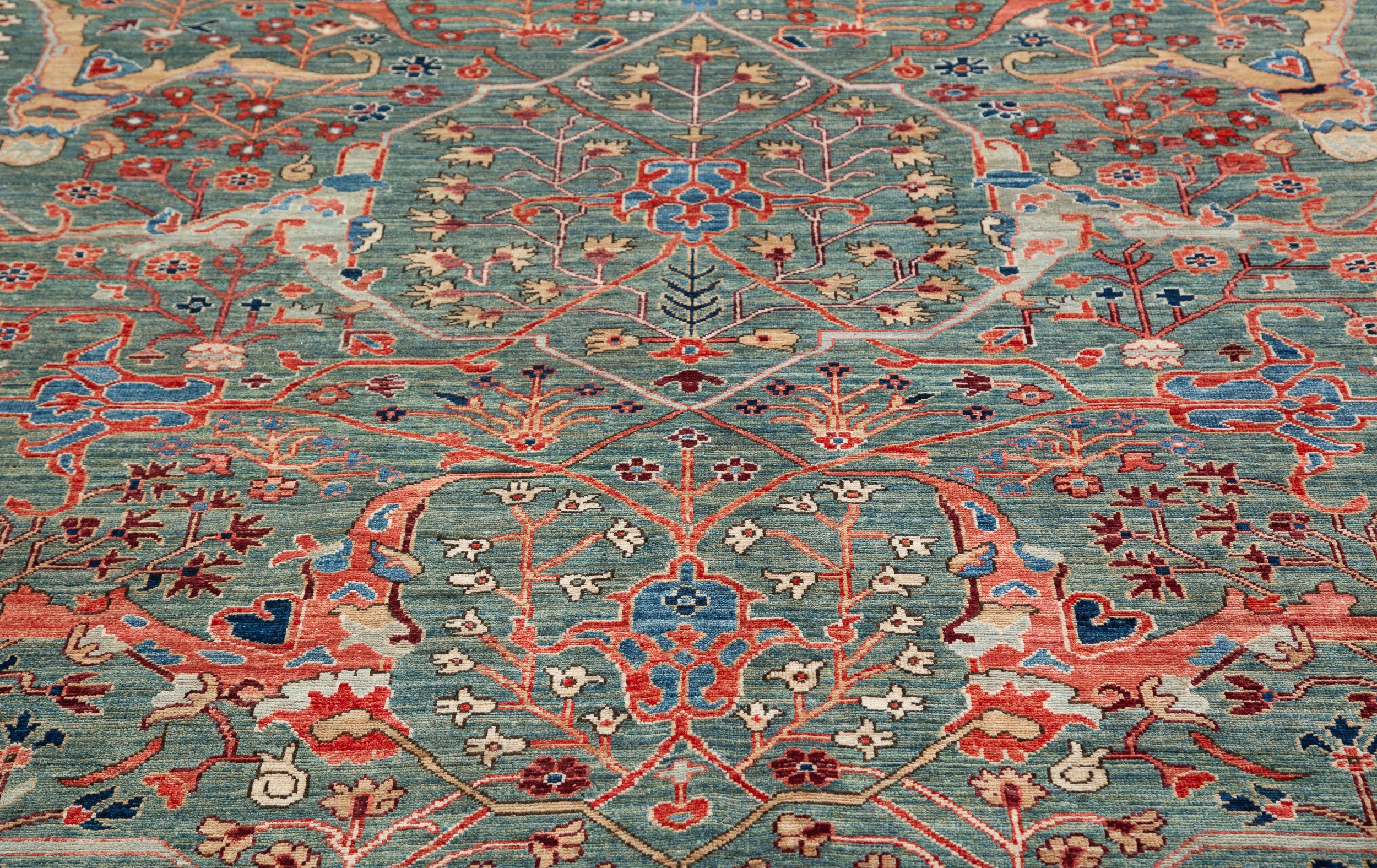 Afghan Chobbi Rug in muted green, rust and navy — pattern, texture or angled view