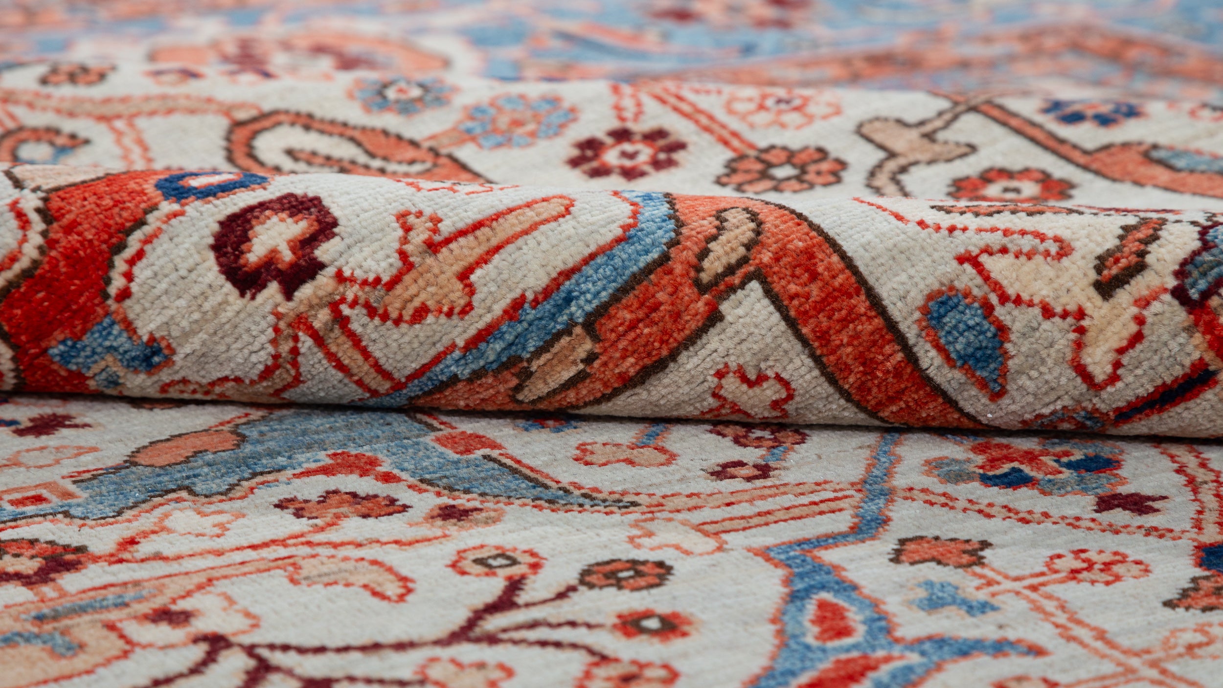 Afghan Chobbi Rug in cream, rust and blue — pattern, texture or angled view