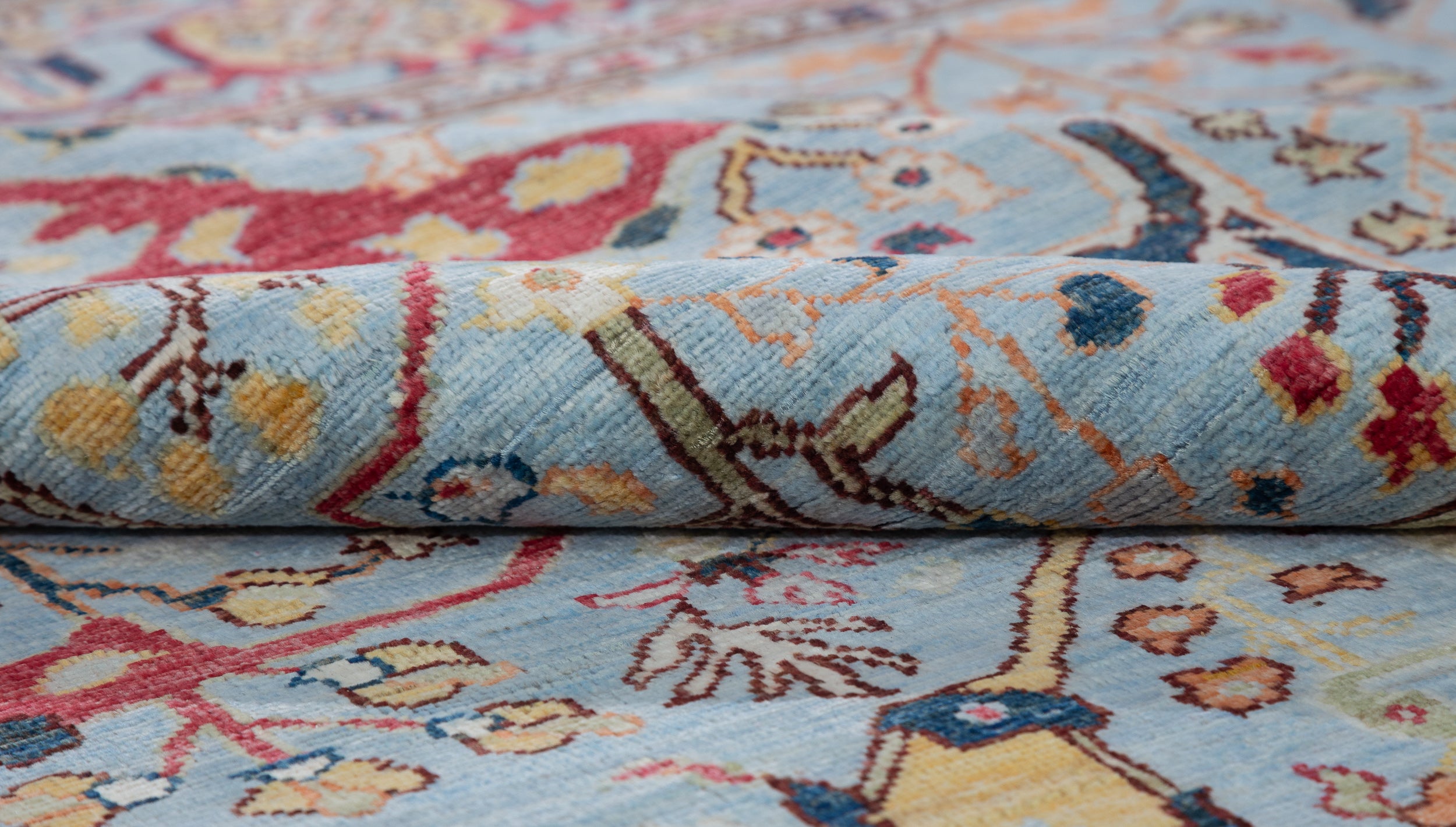 Afghan Sultani Rug in pale blue and multicolor — pattern, texture or angled view