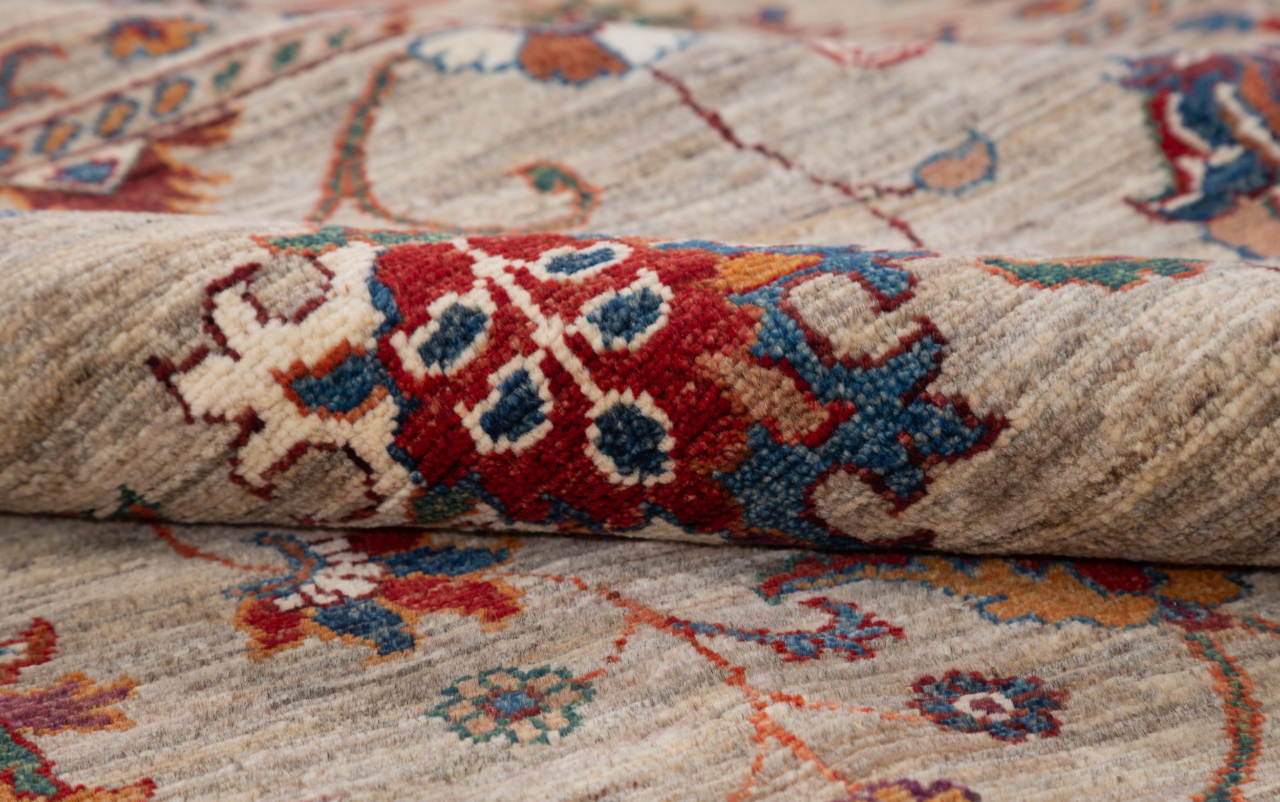 Afghan Sultani Rug in beige and burgundy — pattern, texture or angled view
