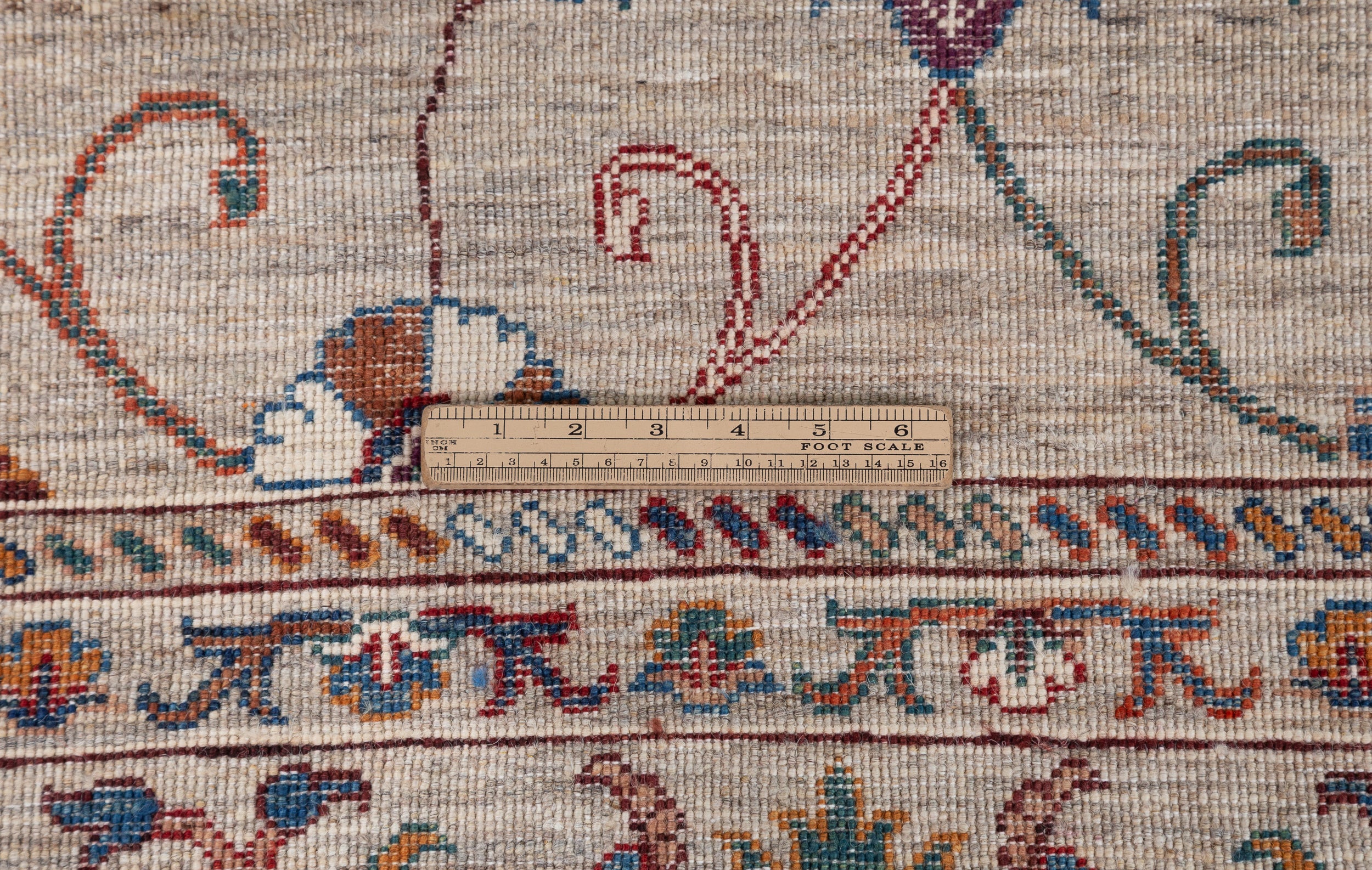 Afghan Sultani Rug in beige and burgundy — pattern, texture or angled view