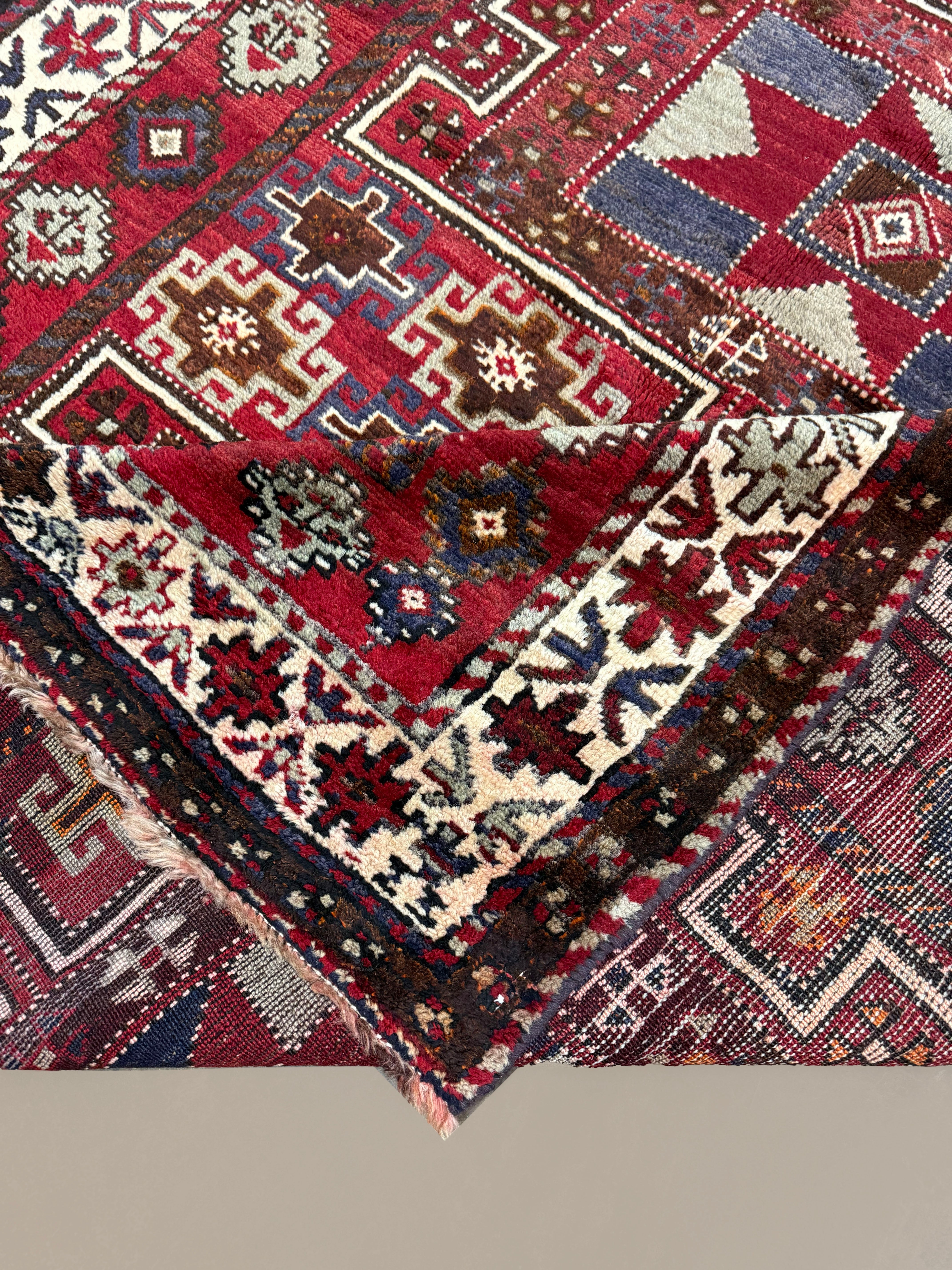 Persian Quchan Kurdish Rug, folded corner and reverse, hand-knotted wool with red colouring. SKU 30811.