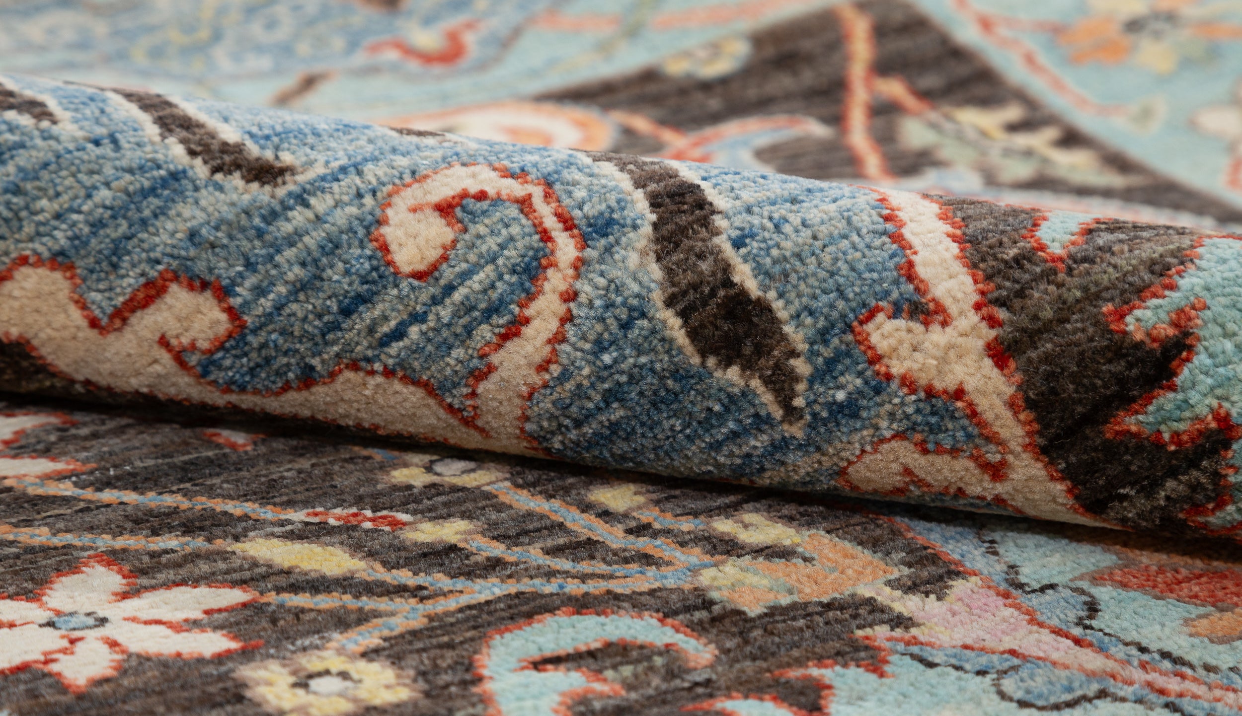 Afghan Chobbi Rug in charcoal, blue and rust — pattern, texture or angled view