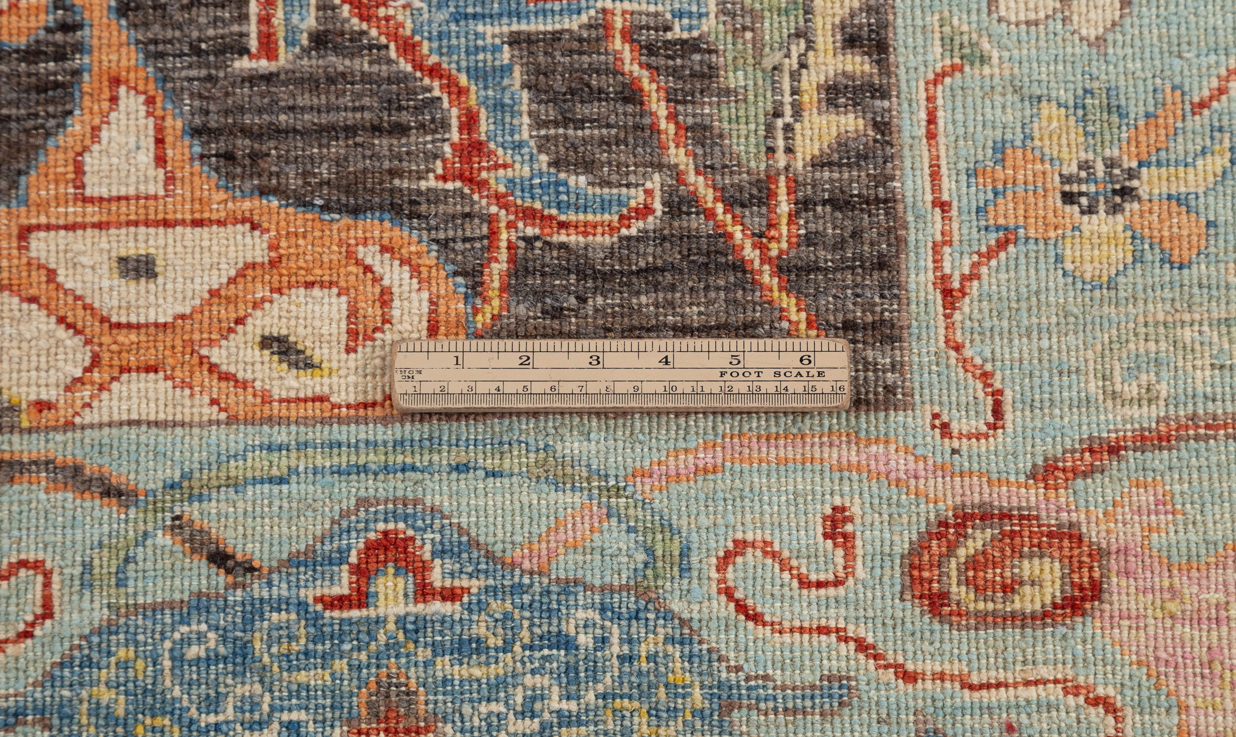 Afghan Chobbi Rug in charcoal, blue and rust — pattern, texture or angled view