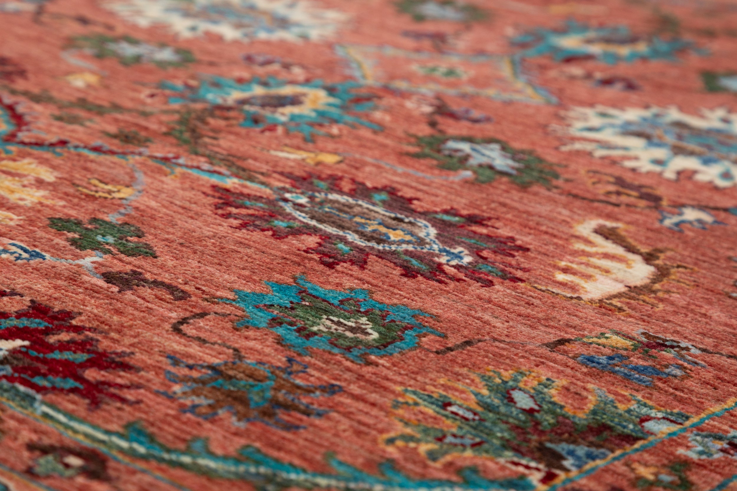 Afghan Sultani Rug in rust and teal — pattern, texture or angled view