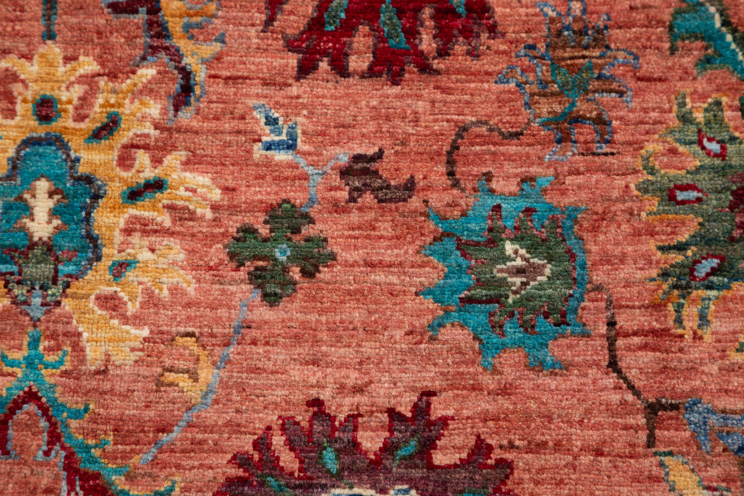 Afghan Sultani Rug in rust and teal — pattern, texture or angled view