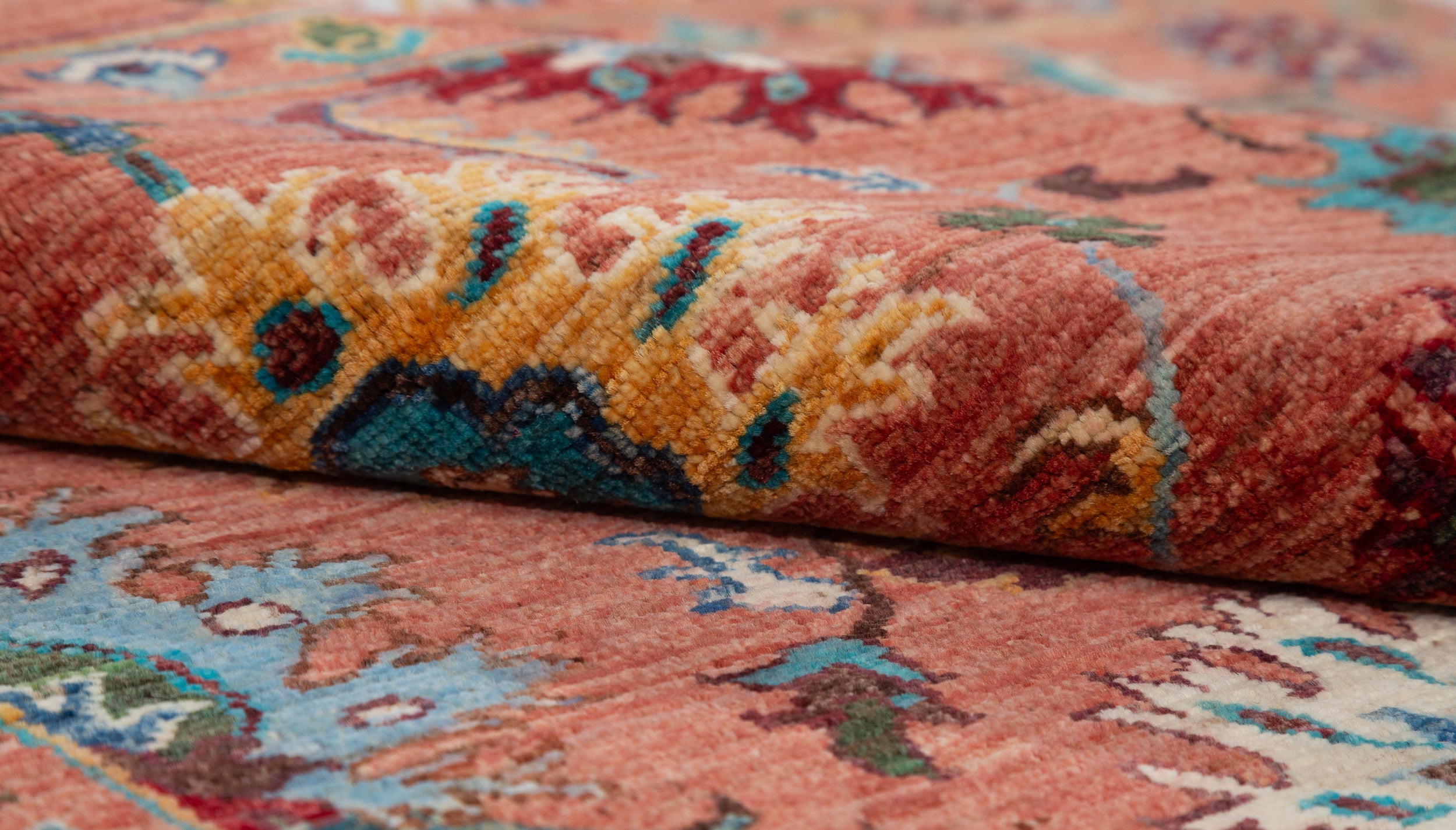 Afghan Sultani Rug in rust and teal — pattern, texture or angled view