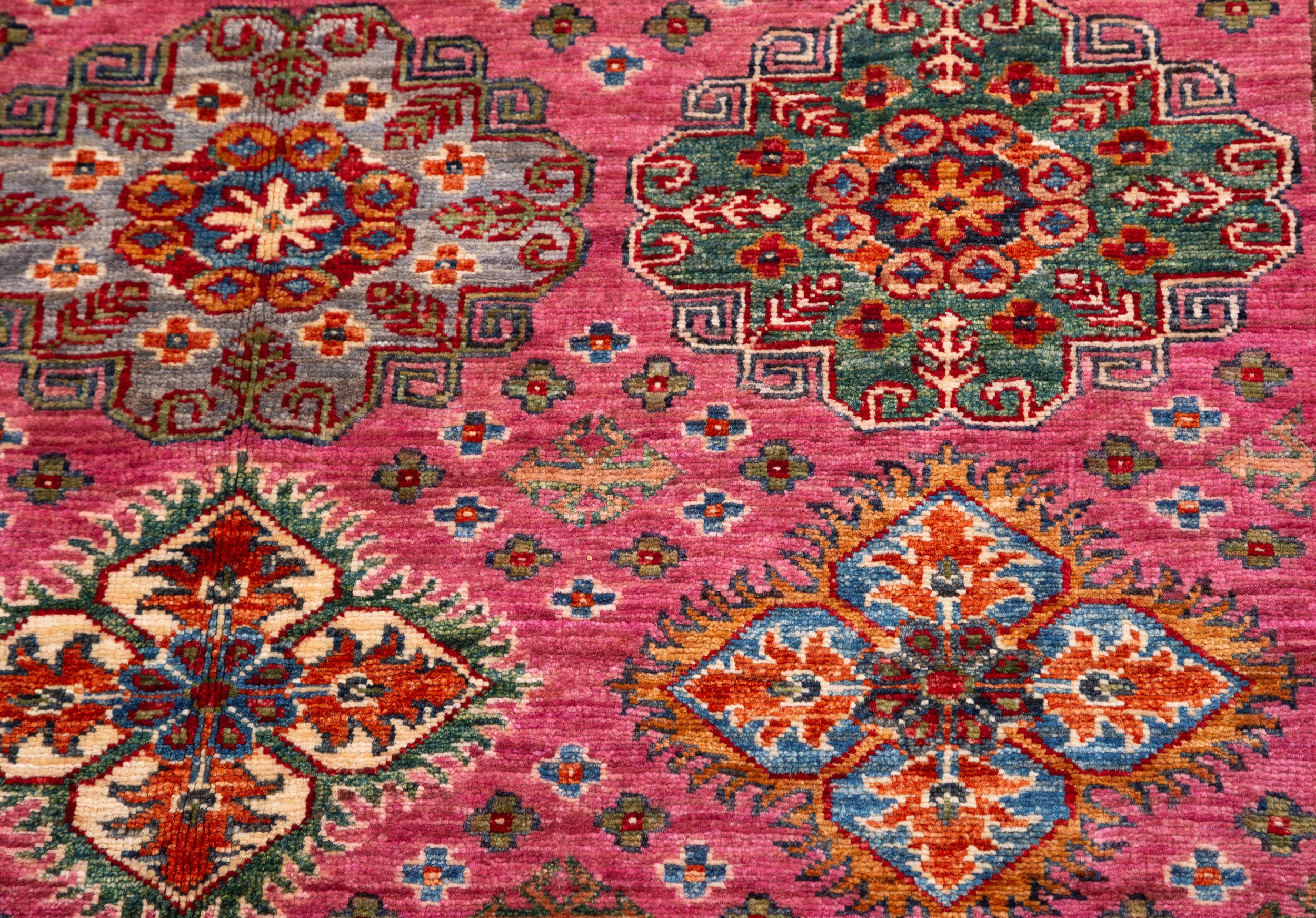 Afghan Super Kazak Rug in rose, navy and gold — pattern, texture or angled view