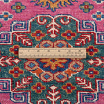Afghan Super Kazak Rug in rose, navy and gold — pattern, texture or angled view