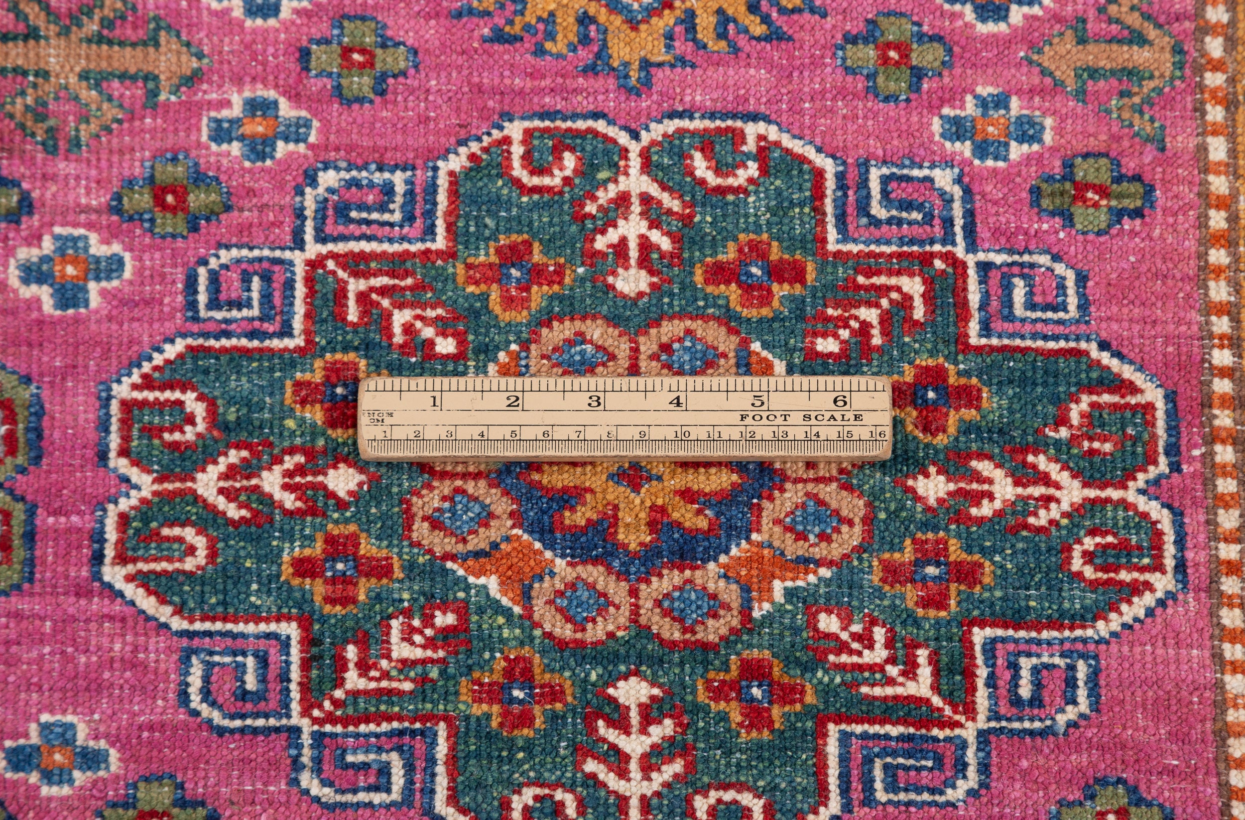 Afghan Super Kazak Rug in rose, navy and gold — pattern, texture or angled view