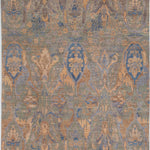 Chobbi Rug in muted blue and gold — full rug view