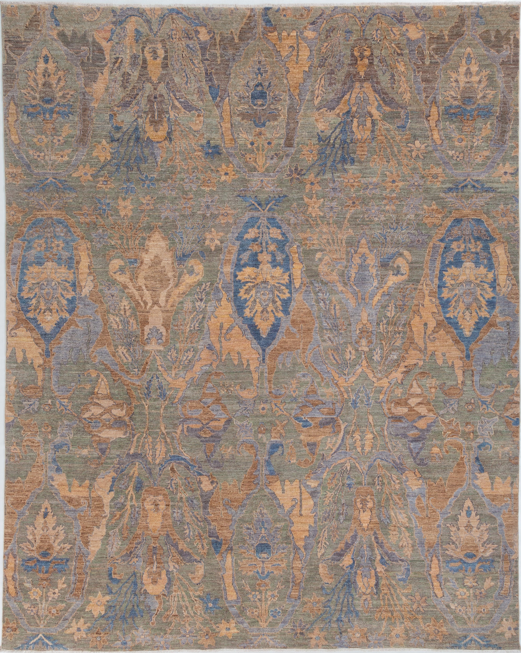 Chobbi Rug in muted blue and gold — full rug view