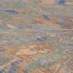Chobbi Rug in muted blue and gold — pattern, texture or angled view