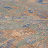 Chobbi Rug in muted blue and gold — pattern, texture or angled view