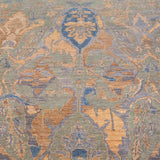 Chobbi Rug in muted blue and gold — pattern, texture or angled view
