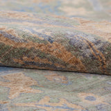 Chobbi Rug in muted blue and gold — pattern, texture or angled view