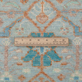 Chobbi Rug in pale turquoise and sand — pattern, texture or angled view
