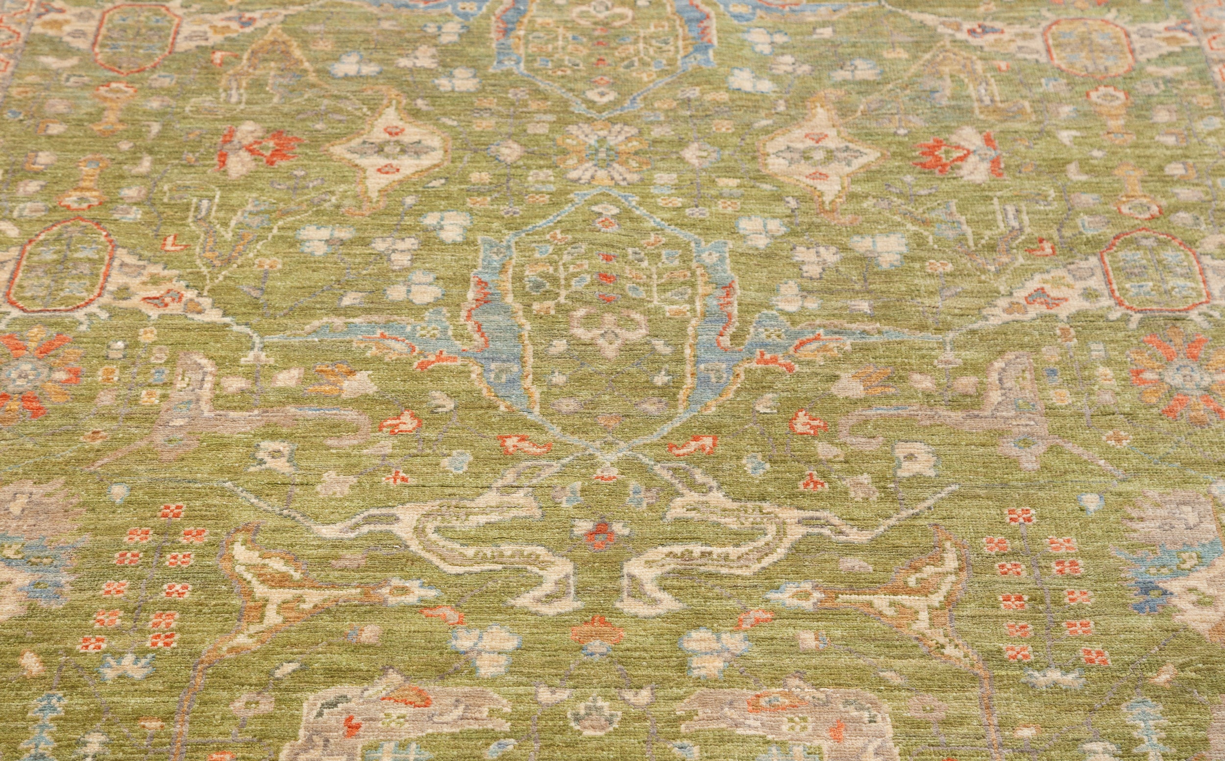 Chobbi Rug in olive green and cream — pattern, texture or angled view