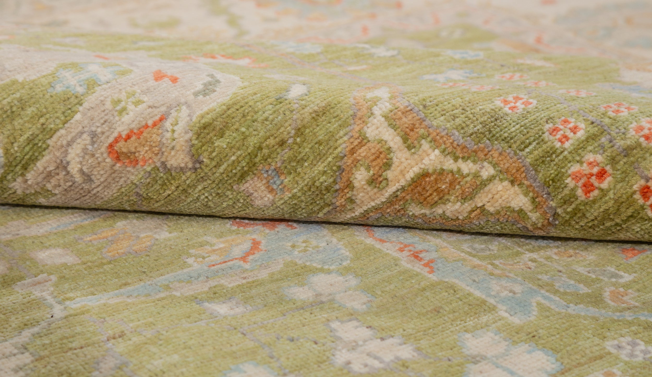 Chobbi Rug in olive green and cream — pattern, texture or angled view