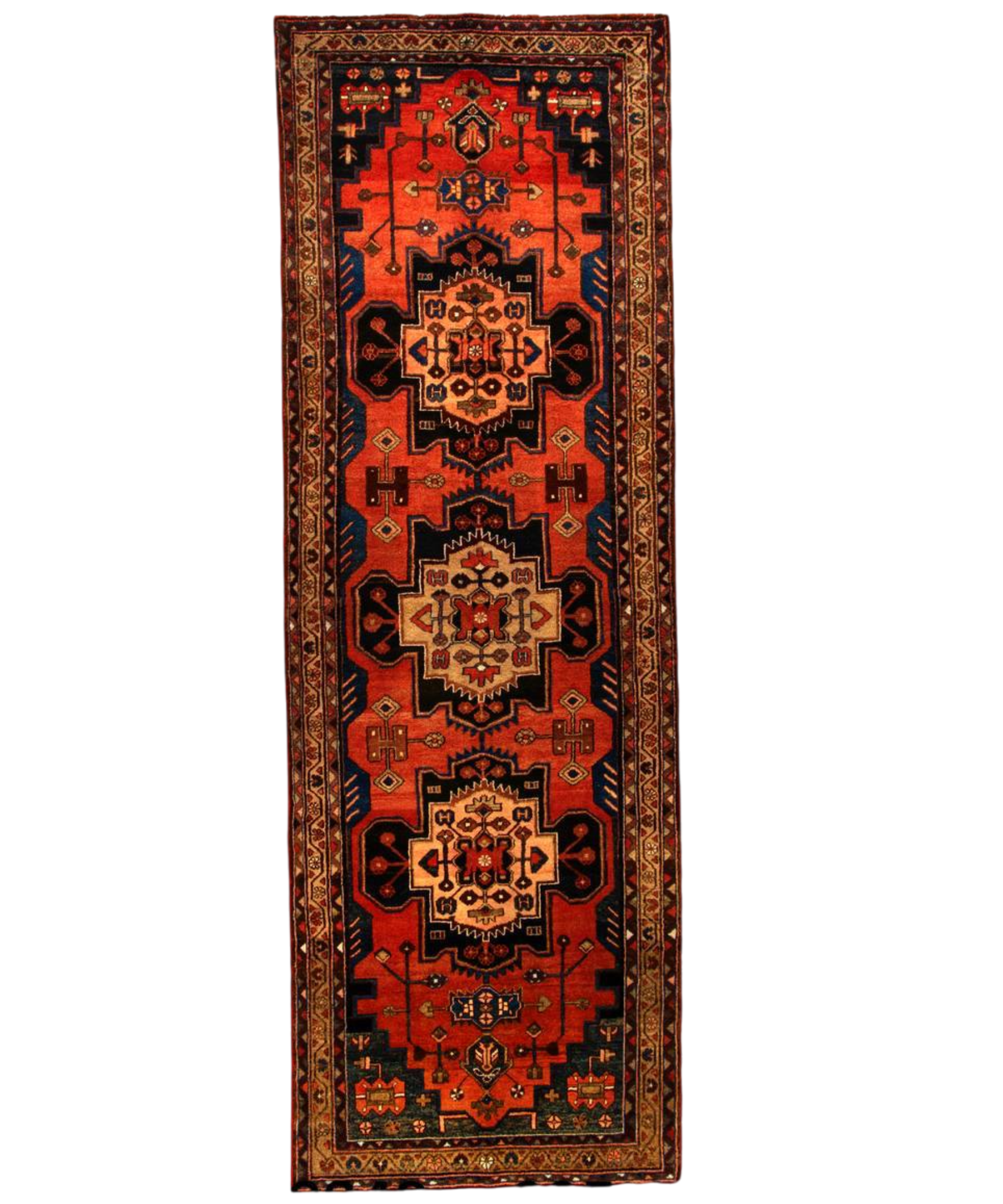 Narrow runner rug with dark red field, gold geometric medallions, and navy border