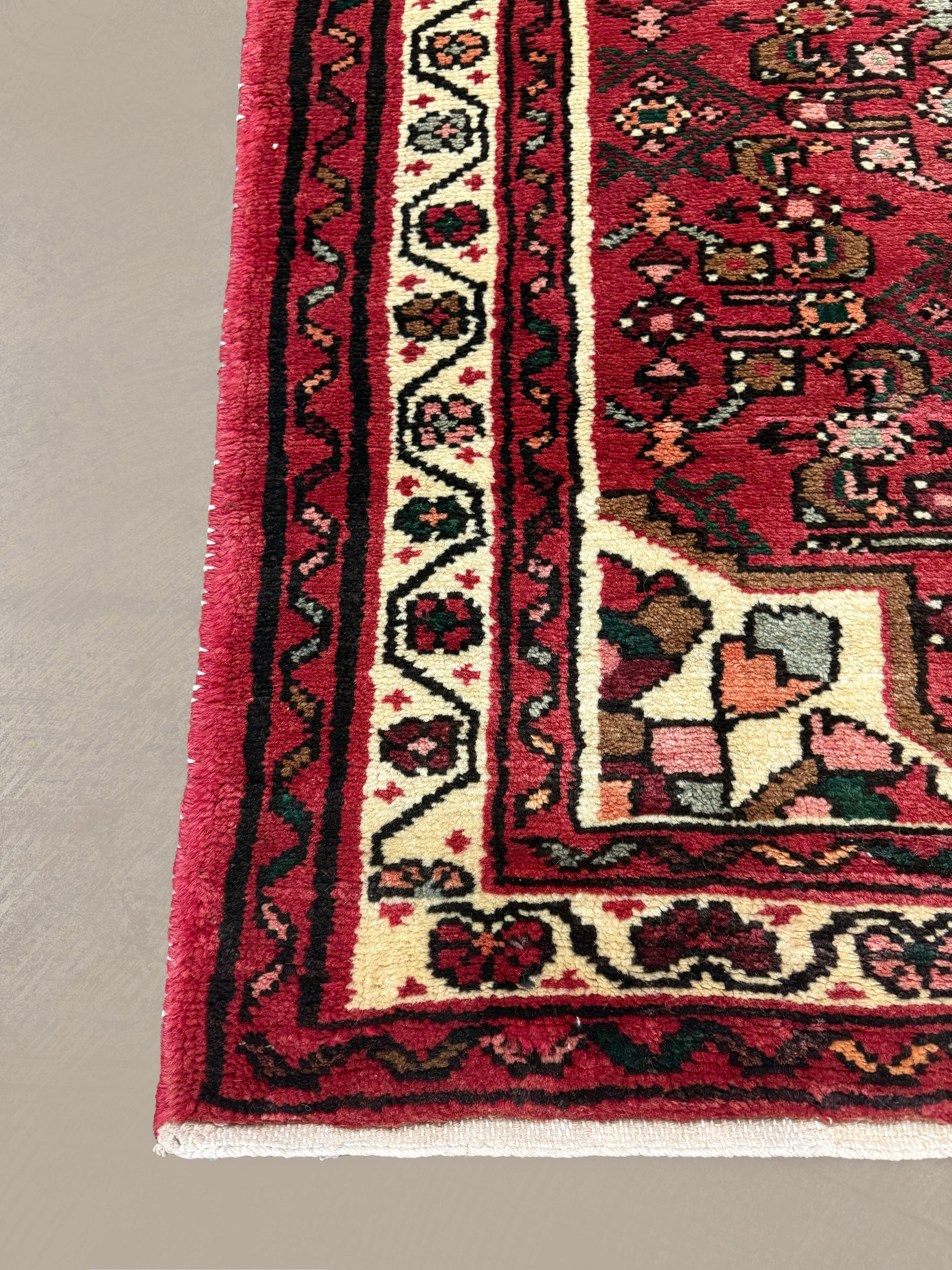 Vintage Hosseinabad Wool Runner | 2'5" × 12'6". Edited documentary rug photograph; SKU EE 1.0067; source undefined.