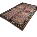 Vintage Sarouk Rug, diagonal perspective view of the complete rug, hand-knotted wool pile. SKU EE 1.0236.