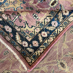 Vintage Sarouk Rug, close-up of the patterned corner and edge, hand-knotted wool pile. SKU EE 1.0236.