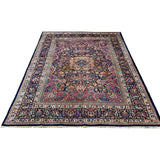 Vintage Mashhad Rug, full rug in perspective showing the patterned field and borders, hand-knotted wool pile. SKU EE 1.0651.