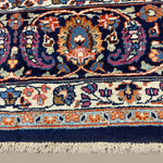 Vintage Mashhad Rug, close-up of the border and fringe, hand-knotted wool pile. SKU EE 1.0651.