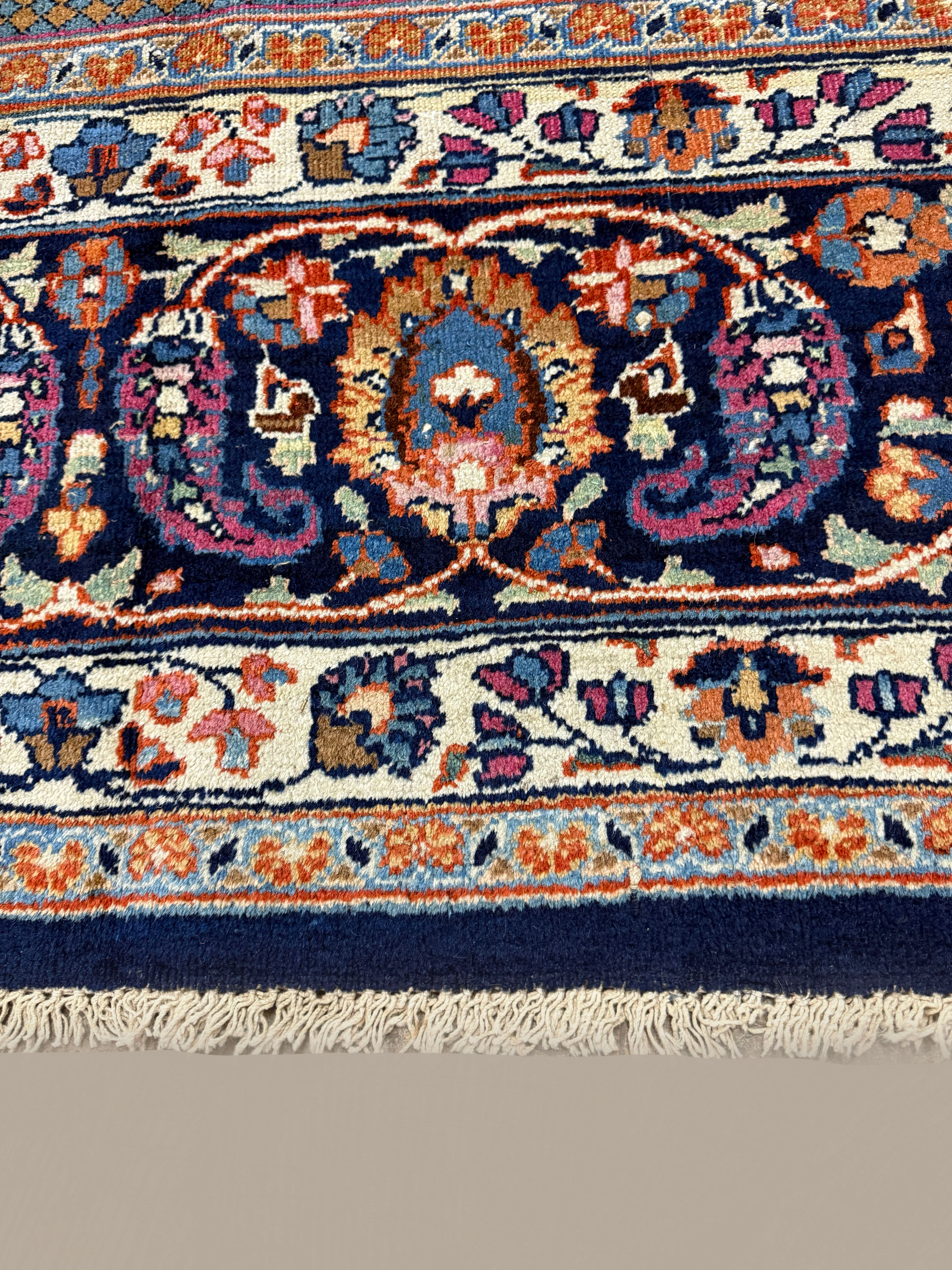 Vintage Mashhad Rug, close-up of the border and fringe, hand-knotted wool pile. SKU EE 1.0651.