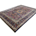 Vintage Mashhad Rug, diagonal perspective view of the complete rug, hand-knotted wool pile. SKU EE 1.0651.