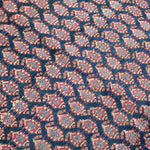 Close-up texture of Persian Malayer rug navy field with red and cream accents