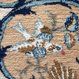 Persian Kashan rug close-up of tan and blue floral pattern with textured pile