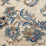 Persian Kashan rug all-over floral and leaf design on cream with blue and gold tones