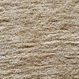 Persian Kashan rug textured cream pile surface, fine speckled weave close-up