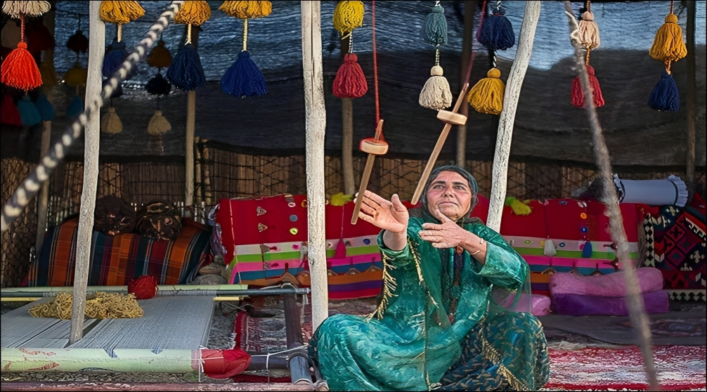 Nomad Woman In Iran with Rug Loom