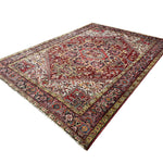 Vintage Bakhshayesh Rug, diagonal perspective view of the complete rug, hand-knotted wool pile. SKU NH 142844.
