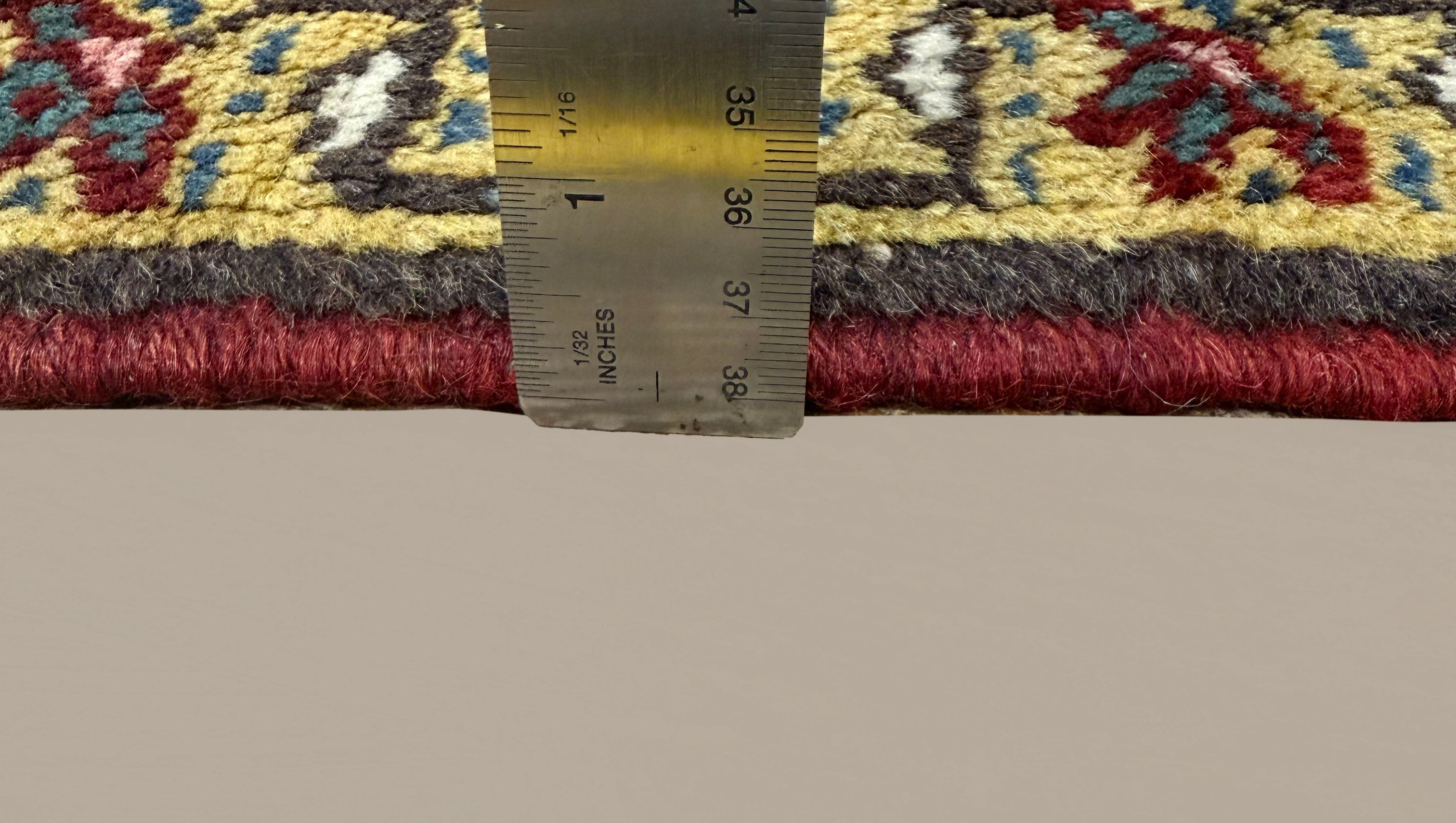 Vintage Bakhshayesh Rug, side-on pile and edge detail with a ruler, hand-knotted wool pile. SKU NH 142844.