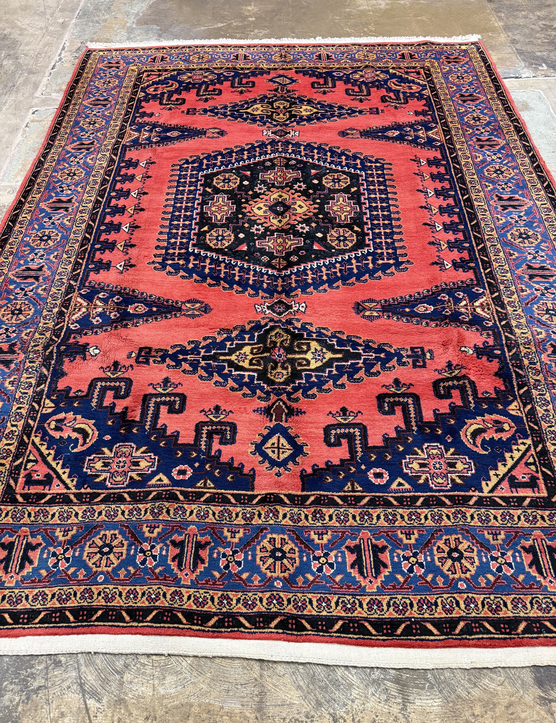 Persian Vise rug 7'2"x9'6", red field with dark navy ornaments and border