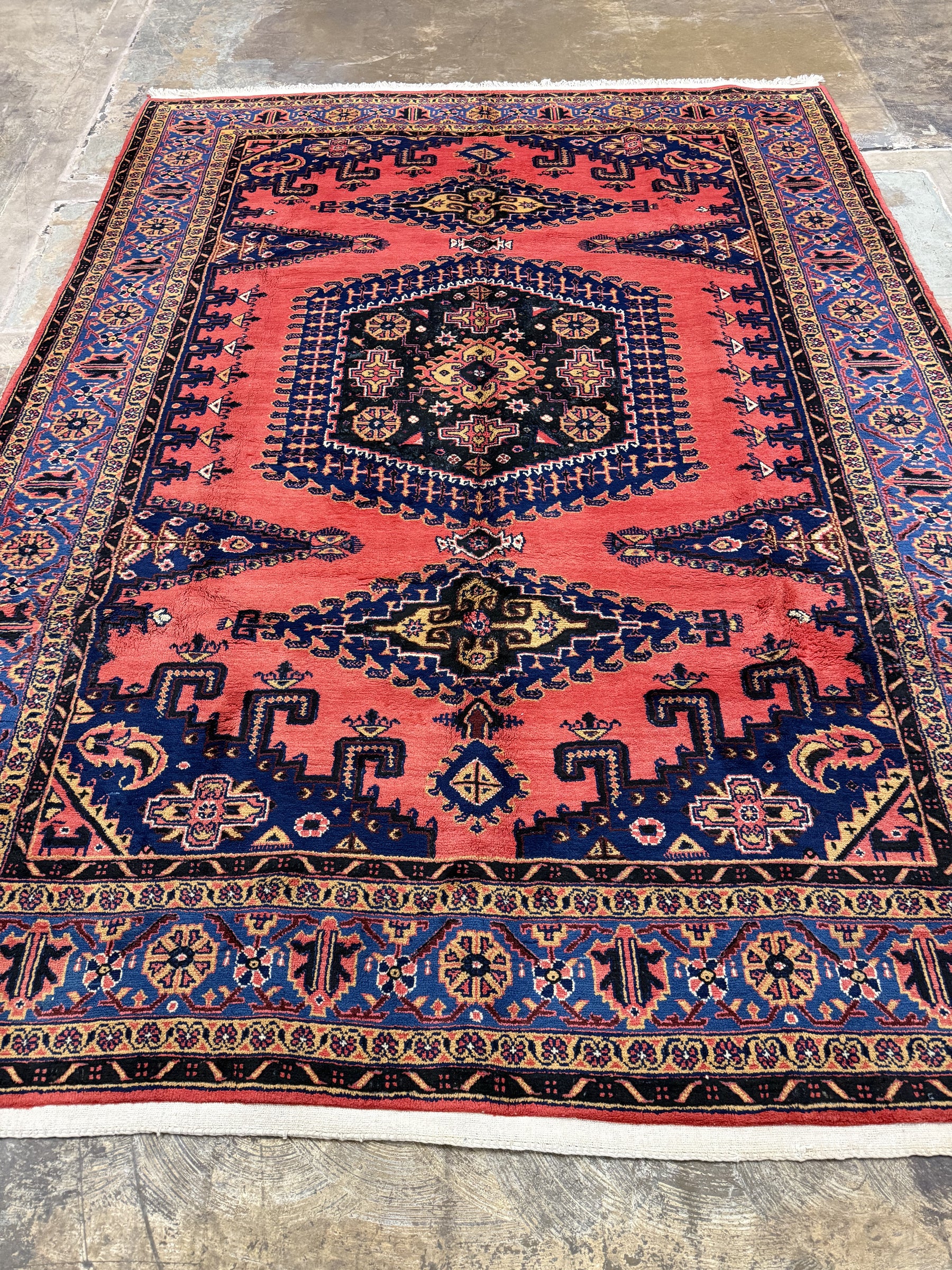 Persian Vise rug 7'2"x9'6", red field with dark navy ornaments and border